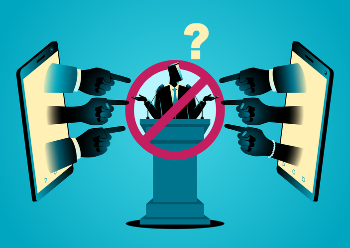 Hands popping up from a mobile phone and pointing at a person on a podium, symbolizing cancel culture, boycotts, and black campaigns on social media, captures the influence of online movements